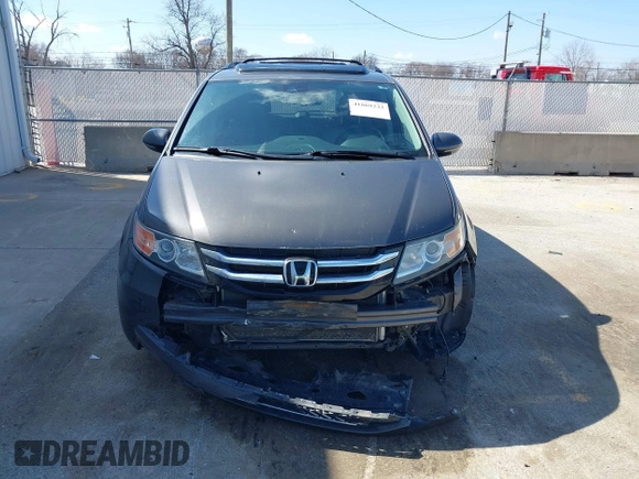 2014 Honda Odyssey Touring with VIN 5FNRL5H97EB101169, listed as a IAAI auction lot 41869233 with 142,147 mi miles and . Bid and sale history available at DreamBid. Image 13.