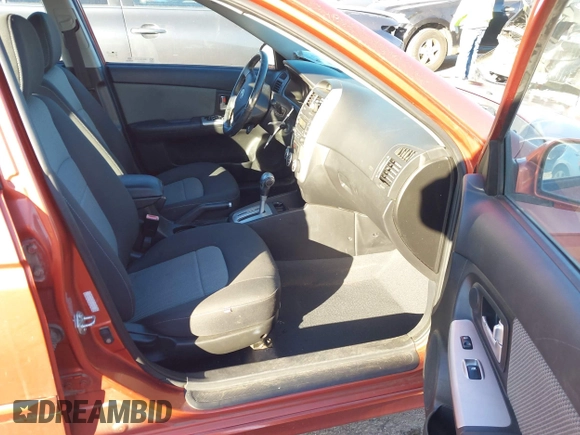 2008 Kia Spectra with VIN KNAFE161985011785, listed as a IAAI auction lot 41076914 with 49,912 mi miles and . Bid and sale history available at DreamBid. Image 5.