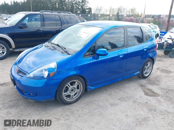 2007 Honda Fit Sport with VIN JHMGD38647S056047, listed as a IAAI auction lot 41956635 with 163,920 mi miles. Bid and sale history available at carsss.com. Image 2.