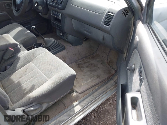 2000 Nissan Frontier XE z VIN 1N6DD26S9YC305451, wystawiony jako IAAI lot #41928123 z przebiegiem Nie podano mil oraz . Historia ofert i sprzedaży dostępna na DreamBid. Obrazek 5.