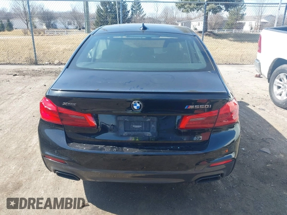 2019 BMW 5 Series M550i xDrive with VIN WBAJB9C51KB464879, listed as a IAAI auction lot 41774834 with 77,379 mi miles and . Bid and sale history available at DreamBid. Image 16.