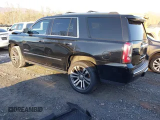 2019 GMC Yukon Denali with VIN 1GKS2CKJ2KR137664, listed as a IAAI auction lot 41335229 with 151,394 mi miles and . Bid and sale history available at DreamBid. Image 3.