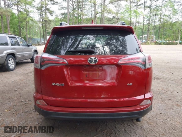 2016 Toyota RAV4 LE with VIN JTMZFREV4GJ062701, listed as a IAAI auction lot 42084694 with 121,553 mi miles and . Bid and sale history available at DreamBid. Image 17.