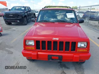 1997 Jeep Cherokee Country with VIN 1J4FJ78SXVL568925, listed as a IAAI auction lot 42254459 with Not provided miles and . Bid and sale history available at DreamBid. Image 13.