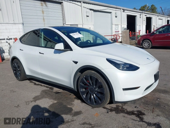 2023 Tesla Model Y Performance with VIN 7SAYGDEF3PF711497, listed as a IAAI auction lot 41877450 with 21,887 mi miles and . Bid and sale history available at DreamBid. Image 1.