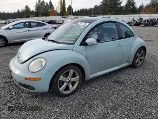 2010 Volkswagen New Beetle Coupe with VIN 3VWRG3AG6AM026310, listed as a Copart auction lot 79057794 with 106,721 mi miles and Salvage Title. Bid and sale history available at carsss.com. Image 1.