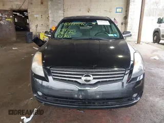 2008 Nissan Altima 2.5 S with VIN 1N4AL21E08C224077, listed as a IAAI auction lot 41812590 with 148,448 mi miles. Bid and sale history available at carsss.com. Image 13.
