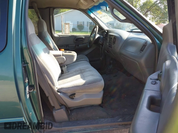 1999 Ford F-150 with VIN 1FTRX18W4XNA50527, listed as a IAAI auction lot 42563746 with 213,959 mi miles and . Bid and sale history available at DreamBid. Image 5.