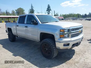 2014 Chevrolet Silverado 1500 LT with VIN 3GCUKREH0EG399090, listed as a IAAI auction lot 42142324 with 104,226 mi miles. Bid and sale history available at carsss.com. Image 1.