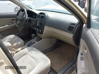 2009 Kia Spectra EX z VIN KNAFE222395663727, wystawiony jako IAAI lot #42278691 z przebiegiem 189 123 mil mil oraz . Historia ofert i sprzedaży dostępna na DreamBid. Obrazek 5.