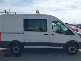 2016 Ford Transit Cargo with VIN 1FTYR1CMXGKA21918, listed as a IAAI auction lot 41528526 with 213,033 mi miles and . Bid and sale history available at DreamBid. Image 13.