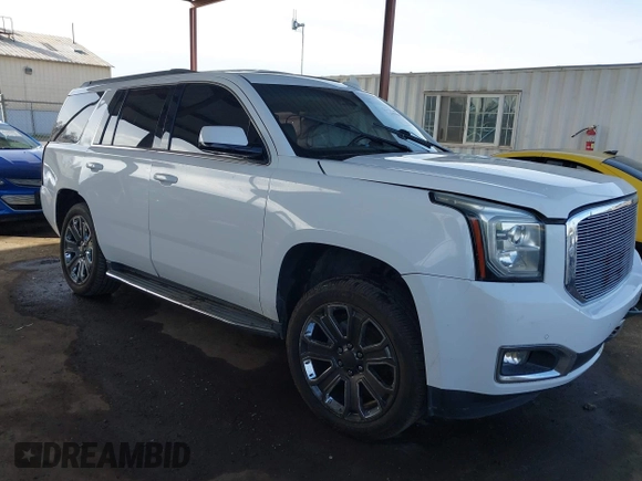 2019 GMC Yukon SLT with VIN 1GKS2BKC5KR109529, listed as a IAAI auction lot 41559860 with 136,025 mi miles. Bid and sale history available at carsss.com. Image 1.