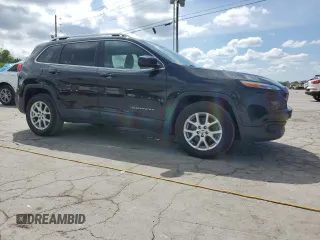 2015 Jeep Cherokee North with VIN 1C4PJMCSXFW610459, listed as a Copart auction lot 54125685 with 118,870 mi miles and Clean Title. Bid and sale history available at carsss.com. Image 4.