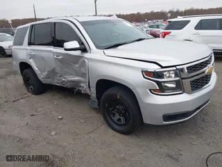 2018 Chevrolet Tahoe Commercial with VIN 1GNLCDEC0JR276911, listed as a IAAI auction lot 40809423 with 110,163 mi miles. Bid and sale history available at carsss.com. Image 1.