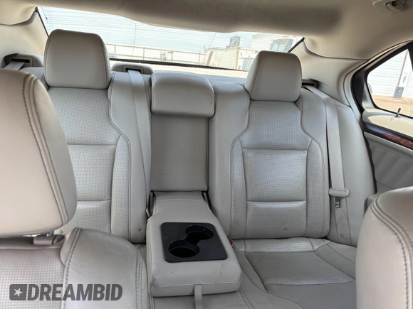 2010 Ford Taurus Limited with VIN 1FAHP2FW3AG125031, listed as a IAAI auction lot 42801338 with 128,310 mi miles and . Bid and sale history available at DreamBid. Image 7.