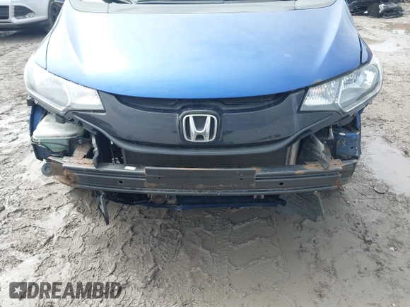 2015 Honda Fit LX with VIN 3HGGK5H52FM710434, listed as a IAAI auction lot 42022022 with 104,118 mi miles. Bid and sale history available at carsss.com. Image 6.