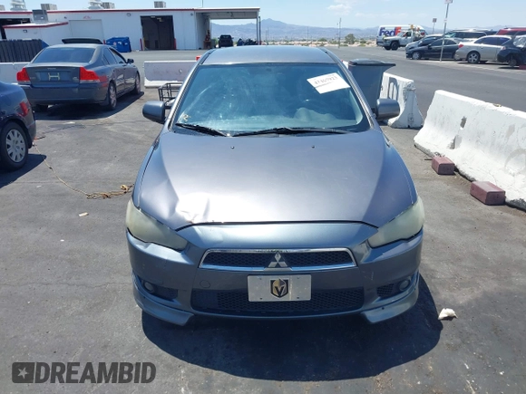 2010 Mitsubishi Lancer GTS z VIN JA32X8HW6AU005689, wystawiony jako IAAI lot #42467923 z przebiegiem 166 508 mil mil oraz . Historia ofert i sprzedaży dostępna na DreamBid. Obrazek 6.