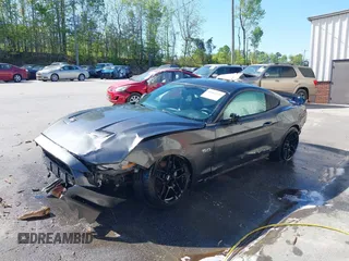 2018 Ford Mustang GT z VIN 1FA6P8CF3J5182601, wystawiony jako IAAI lot #41661225 z przebiegiem 67 898 mil mil oraz . Historia ofert i sprzedaży dostępna na DreamBid. Obrazek 18.
