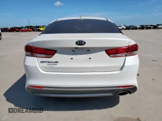 2017 Kia Optima LX с VIN KNAGT4L30H5170812, выставлен на аукционе Copart как лот 63007185 с пробегом 118 804 миль миль и Списание • Salvage title. История ставок и продаж доступна на DreamBid. Изображение 6.