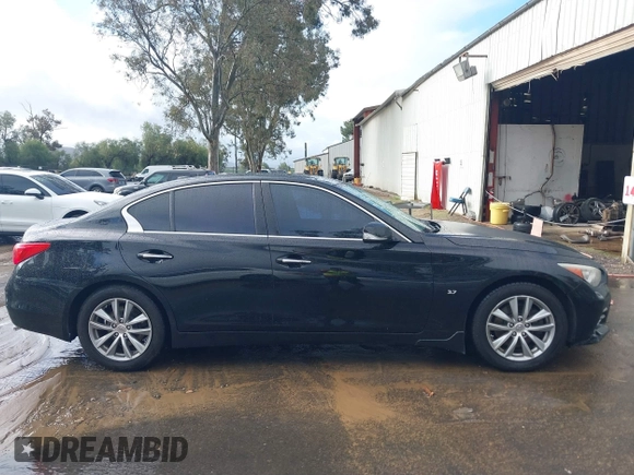 2014 Infiniti Q50 with VIN JN1BV7AP8EM675841, listed as a IAAI auction lot 41582924 with 139,637 mi miles. Bid and sale history available at carsss.com. Image 14.