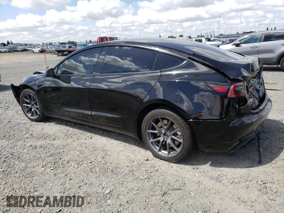 2023 Tesla Model 3 with VIN 5YJ3E1EA6PF454254, listed as a Copart auction lot 56881355 with 30,327 mi miles and Salvage title. Bid and sale history available at DreamBid. Image 2.
