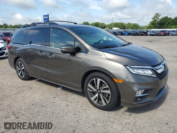 2019 Honda Odyssey Elite z VIN 5FNRL6H90KB027207, wystawiony jako Copart lot #60265905 z przebiegiem 69 313 mil mil oraz Szkoda całkowita • Salvage title. Historia ofert i sprzedaży dostępna na DreamBid. Obrazek 4.