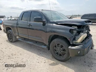 2014 Toyota Tundra SR с VIN 5TFRM5F12EX071952, выставлен на аукционе Copart как лот 57252215 с пробегом 143 706 миль миль и Списание • Salvage title. История ставок и продаж доступна на DreamBid. Изображение 4.