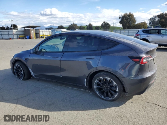 2023 Tesla Model Y Long Range with VIN 7SAYGDEE9PF638742, listed as a Copart auction lot 48188455 with 30,550 mi miles and Salvage Title. Bid and sale history available at DreamBid. Image 2.
