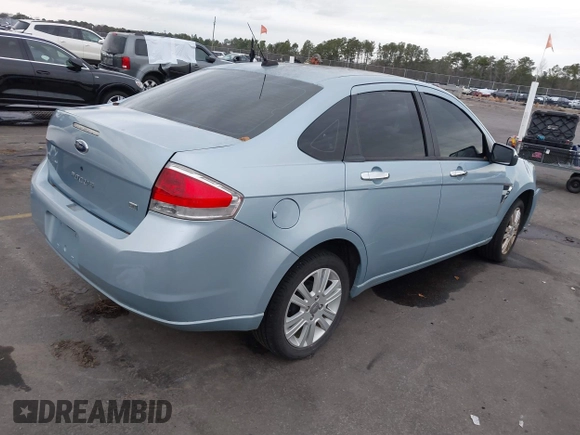 2008 Ford Focus SE with VIN 1FAHP35N78W270569, listed as a IAAI auction lot 38518647 with 173,674 mi miles. Bid and sale history available at carsss.com. Image 4.