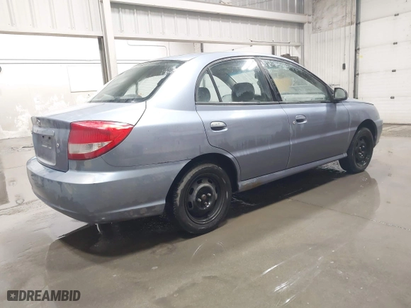 2003 Kia Rio with VIN KNADC125536274171, listed as a IAAI auction lot 41986369 with 59,837 mi miles. Bid and sale history available at carsss.com. Image 4.