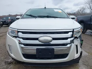 2013 Ford Edge SEL with VIN 2FMDK3J93DBB16822, listed as a IAAI auction lot 41995178 with 242,376 mi miles. Bid and sale history available at carsss.com. Image 12.