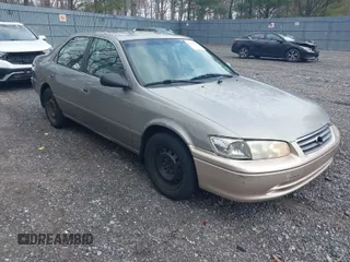 2001 Toyota Camry CE with VIN JT2BG22K710558243, listed as a IAAI auction lot 41954053 with 126,274 mi miles. Bid and sale history available at carsss.com. Image 1.