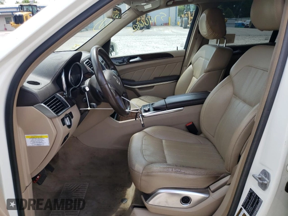 2013 Mercedes-Benz GL 450 z VIN 4JGDF7CE5DA249440, wystawiony jako Copart lot #57466825 z przebiegiem 120 163 mil mil oraz Tytuł czysty. Historia ofert i sprzedaży dostępna na DreamBid. Obrazek 7.