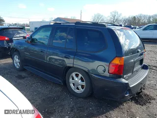 2005 GMC Envoy Denali with VIN 1GKET63M052336214, listed as a IAAI auction lot 41852417 with 999,999 mi miles. Bid and sale history available at carsss.com. Image 3.