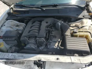 2006 Dodge Charger z VIN 2B3KA43G06H502230, wystawiony jako Copart lot #57057535 z przebiegiem 135 230 mil mil oraz Szkoda całkowita • Salvage title. Historia ofert i sprzedaży dostępna na DreamBid. Obrazek 11.