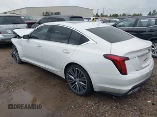 2023 Cadillac CT5 Premium Luxury z VIN 1G6DN5RKXP0123435, wystawiony jako IAAI lot #41565443 z przebiegiem 31 263 mil mil oraz . Historia ofert i sprzedaży dostępna na DreamBid. Obrazek 3.