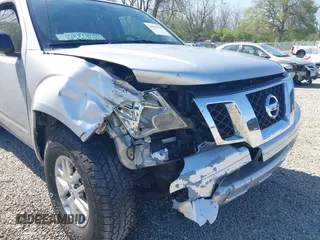 2014 Nissan Frontier SV with VIN 1N6AD0ERXEN720686, listed as a IAAI auction lot 42085114 with 275,745 mi miles and . Bid and sale history available at DreamBid. Image 6.