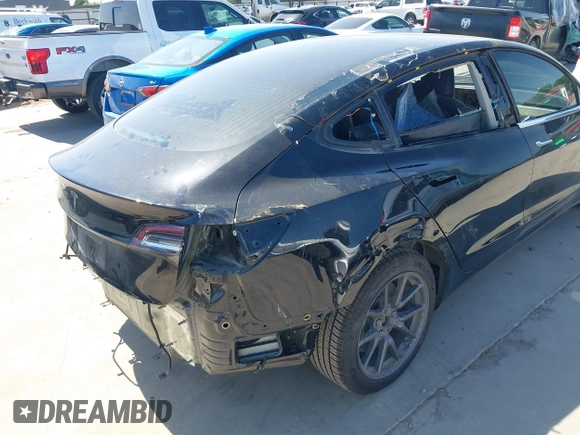 2018 Tesla Model 3 Long Range Battery with VIN 5YJ3E1EA7JF098632, listed as a IAAI auction lot 42002181 with 73,371 mi miles and . Bid and sale history available at DreamBid. Image 20.