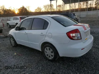 2010 Suzuki SX4 LE with VIN JS2YC5A24A6301771, listed as a Copart auction lot 83049774 with 165,033 mi miles and Salvage Title. Bid and sale history available at carsss.com. Image 2.