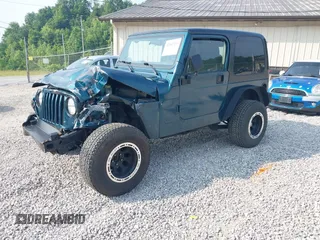 1998 Jeep Wrangler Sport with VIN 1J4FY19S2WP786844, listed as a IAAI auction lot 42382789 with 306,228 mi miles and . Bid and sale history available at DreamBid. Image 2.