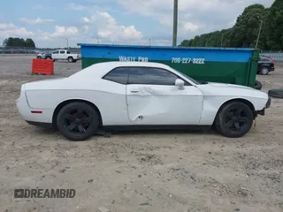 2013 Dodge Challenger SXT с VIN 2C3CDYAG0DH607372, выставлен на аукционе IAAI как лот 42819112 с пробегом 223 376 миль миль и . История ставок и продаж доступна на DreamBid. Изображение 13.