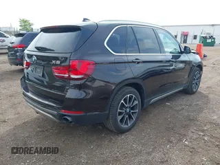 2017 BMW X5 xDrive35i z VIN 5UXKR0C56H0U49957, wystawiony jako IAAI lot #42183768 z przebiegiem 96 346 mil mil oraz . Historia ofert i sprzedaży dostępna na DreamBid. Obrazek 4.