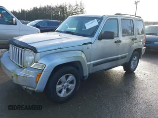 2010 Jeep Liberty Sport with VIN 1J4PN2GK0AW153442, listed as a IAAI auction lot 41732415 with 206,834 mi miles. Bid and sale history available at carsss.com. Image 2.