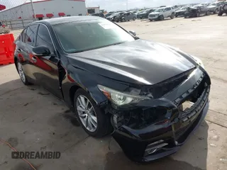 2015 Infiniti Q50 with VIN JN1BV7AP3FM335871, listed as a IAAI auction lot 41472424 with 127,383 mi miles. Bid and sale history available at carsss.com. Image 1.