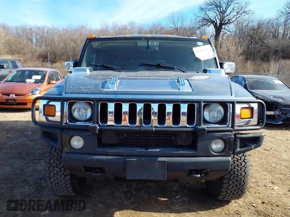 2005 Hummer H2 SUV with VIN 5GRGN23U15H117796, listed as a IAAI auction lot 41543913 with 195,560 mi miles. Bid and sale history available at carsss.com. Image 6.