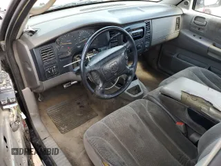 2001 Dodge Dakota z VIN 1B7GL22X81S204868, wystawiony jako Copart lot #57178895 z przebiegiem 298 667 mil mil oraz Szkoda całkowita • Salvage title. Historia ofert i sprzedaży dostępna na DreamBid. Obrazek 8.