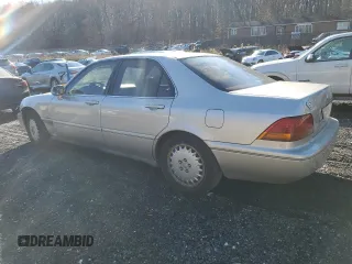 1996 Acura RL with VIN JH4KA9655TC012935, listed as a Copart auction lot 80861334 with 0 mi miles and Salvage Title. Bid and sale history available at carsss.com. Image 2.