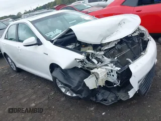 2012 Toyota Camry XLE z VIN 4T1BD1FK1CU020262, wystawiony jako IAAI lot #41934186 z przebiegiem Nie podano mil oraz . Historia ofert i sprzedaży dostępna na DreamBid. Obrazek 1.