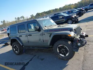 2020 Jeep Wrangler Unlimited Rubicon with VIN 1C4HJXFN4LW136516, listed as a IAAI auction lot 41874403 with 87,576 mi miles. Bid and sale history available at carsss.com. Image 13.