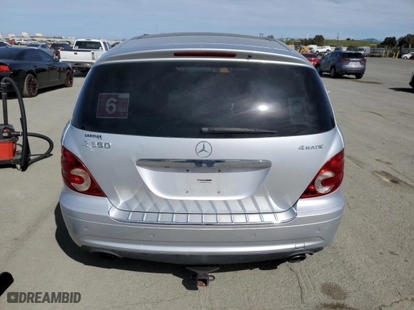 2009 Mercedes-Benz R-Class 3.5L with VIN 4JGCB65E79A091057, listed as a Copart auction lot 52186915 with 99,173 mi miles and Salvage Title. Bid and sale history available at carsss.com. Image 6.